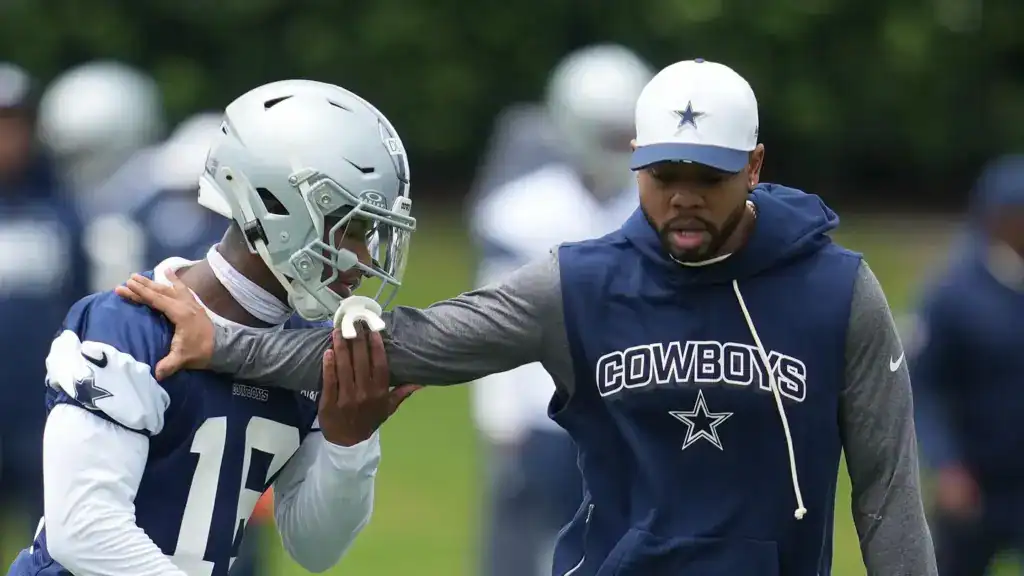 Christian Parker's Hire Follows a Cowboys Super Bowl Pattern Dallas Cowboys defensive coordinator Christian Parker working with rookie safety Caleb Downs during Cowboys mini-camp.
