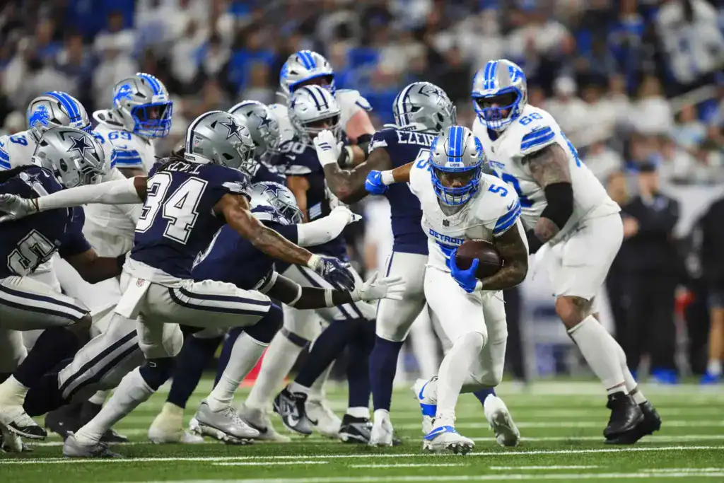 Dallas Cowboys defense tries to tackle a Detroit Lions ball carrier, exposing a defensive problem the numbers barely explain.