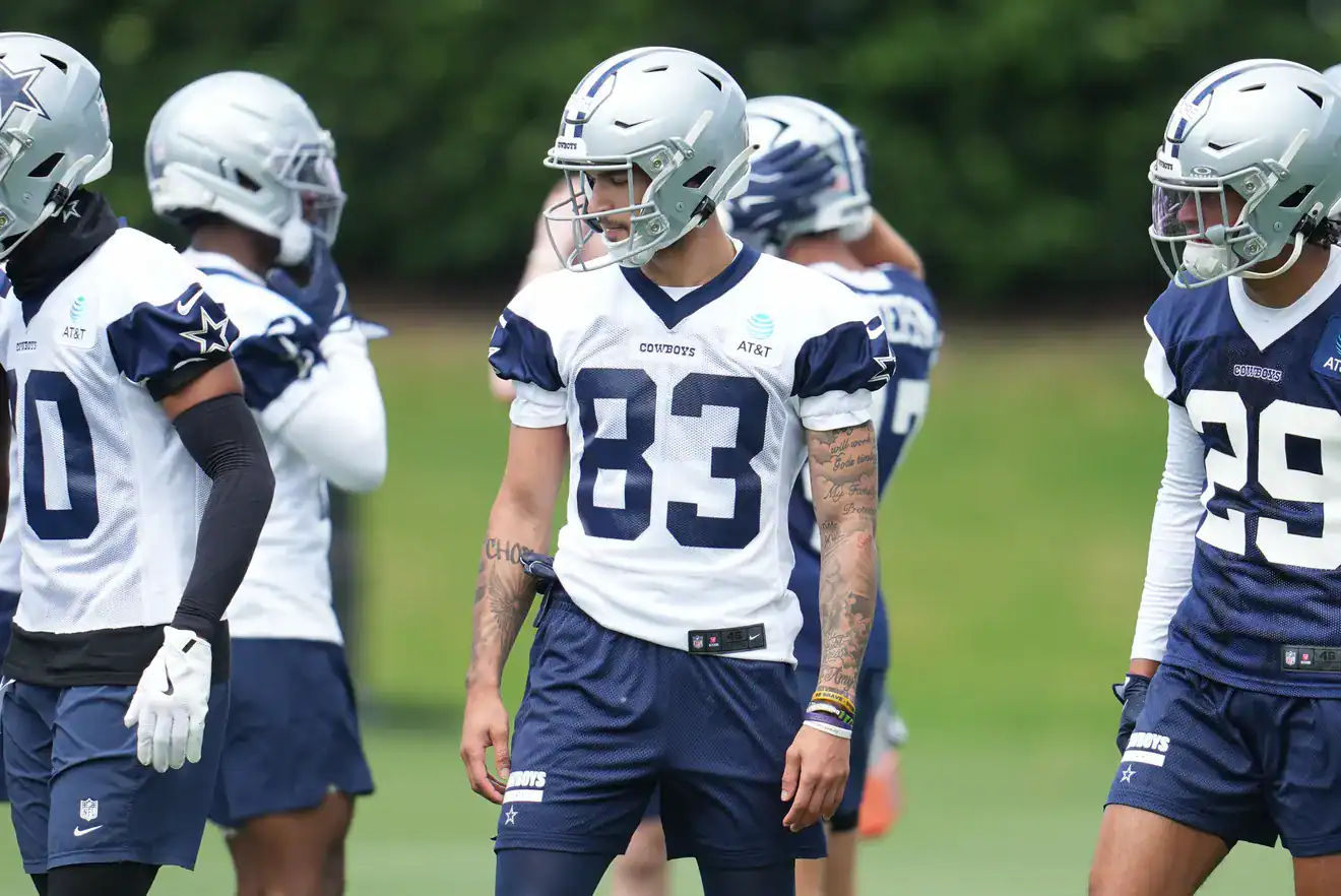 Dallas Cowboys rookie wide receiver Anthony Smith stands at practice waiting to get involved in camp.