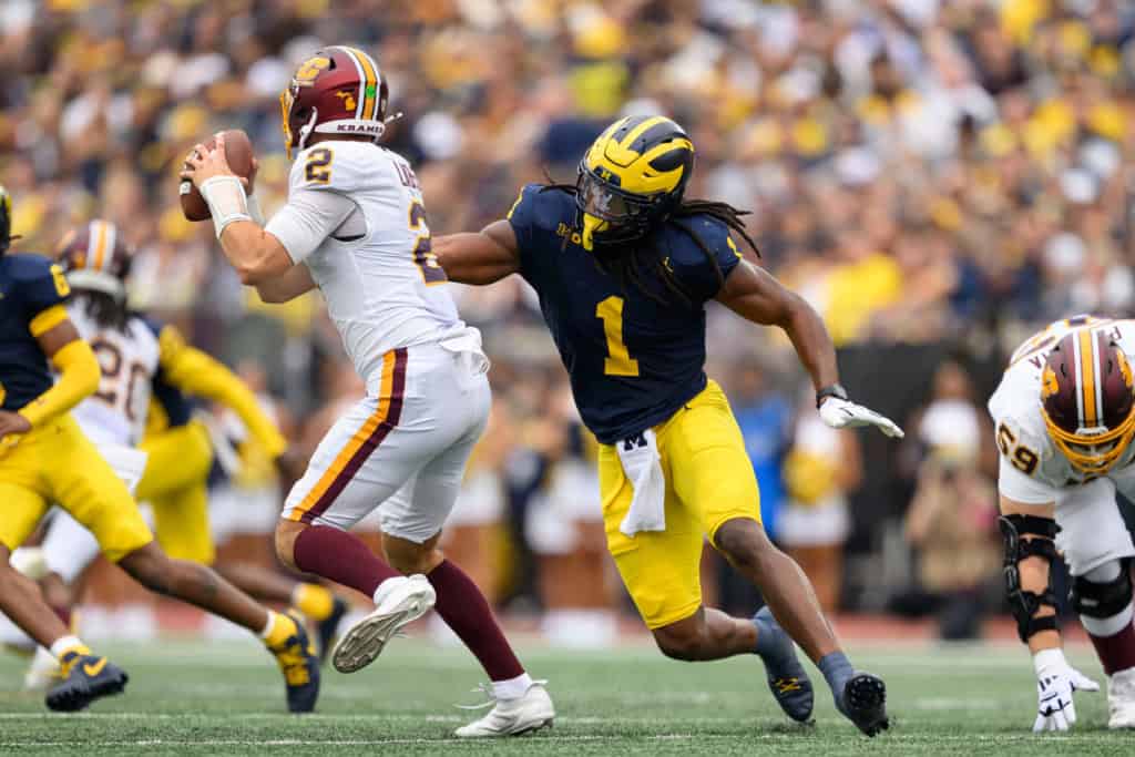 Jaishawn Barham: A Dark Horse 26' Defensive Rookie of the Year Candidate Jaishawn Barham pressures a Central Michigan quarterback while playing for the Michigan Wolverines.