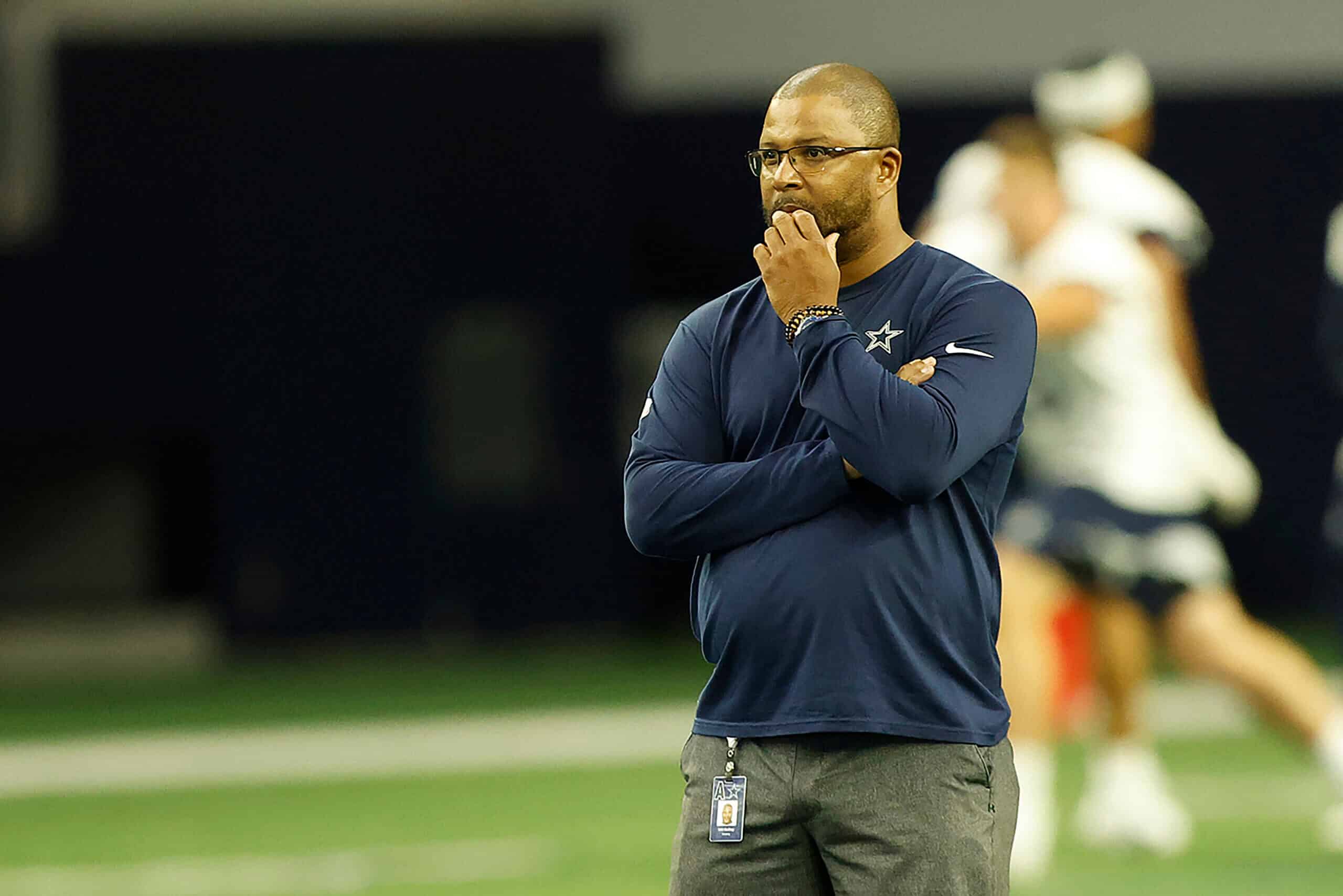 Will McClay evaluates the Cowboys roster from the sideline during practice.