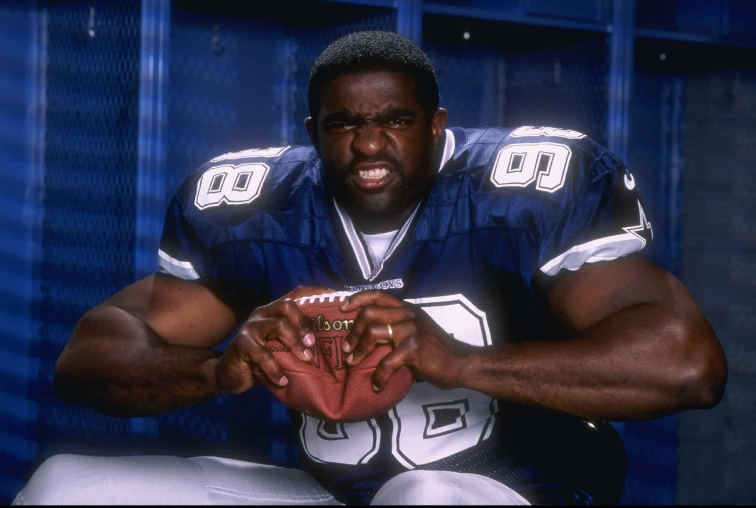 Greg Ellis in a Dallas Cowboys uniform, tying his pass-rush background to the risk in the Cowboys’ 2026 defensive switch.