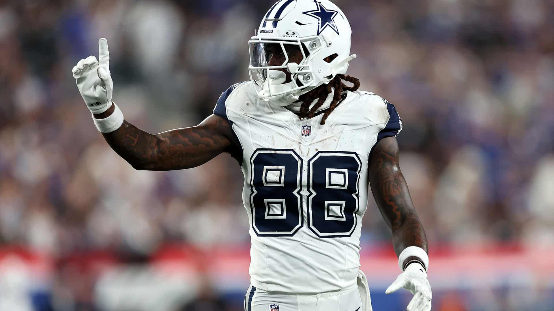 CeeDee Lamb celebrates during a Dallas Cowboys game as ESPN's Cowboys roster ranking puts the team under the spotlight.