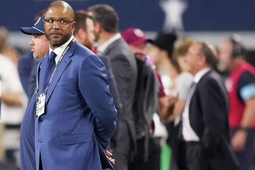 Will McClay stands on the sideline before a Dallas Cowboys game at AT&T Stadium.