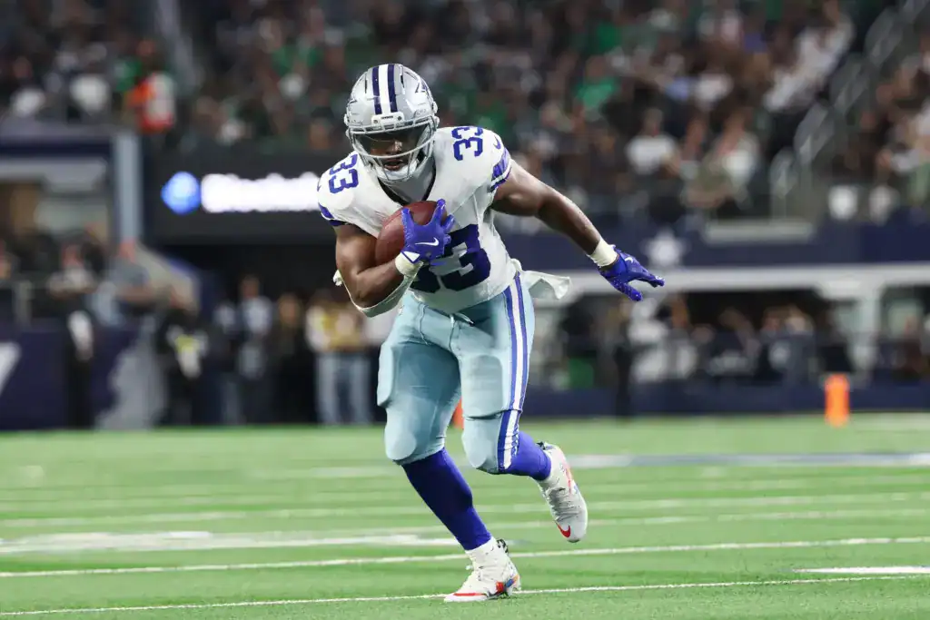 Javonte Williams carries the football as the Cowboys running back room strengthens the offensive position group rankings.
