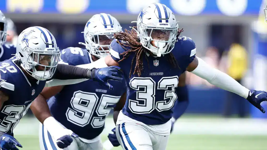 Julius Wood fights through traffic during a defensive play for the Dallas Cowboys. Will Wood make the Cowboys practice squad?