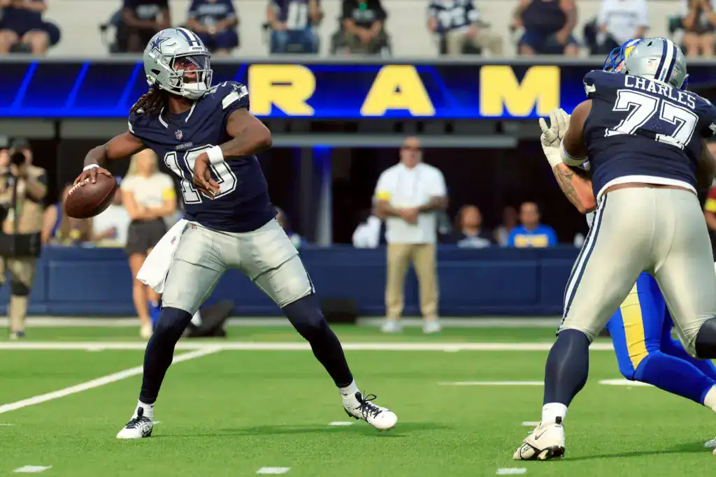 Joe Milton drops back to pass for the Dallas Cowboys during a game against the Los Angeles Rams.