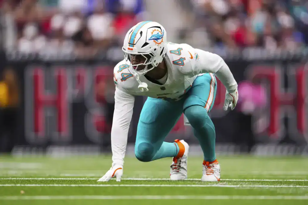 Cowboys Edge Trade Targets: 5 Names to Watch Miami Dolphins edge rusher Chop Robinson lines up before the snap. Robinson is a possible Dallas Cowboys trade target.