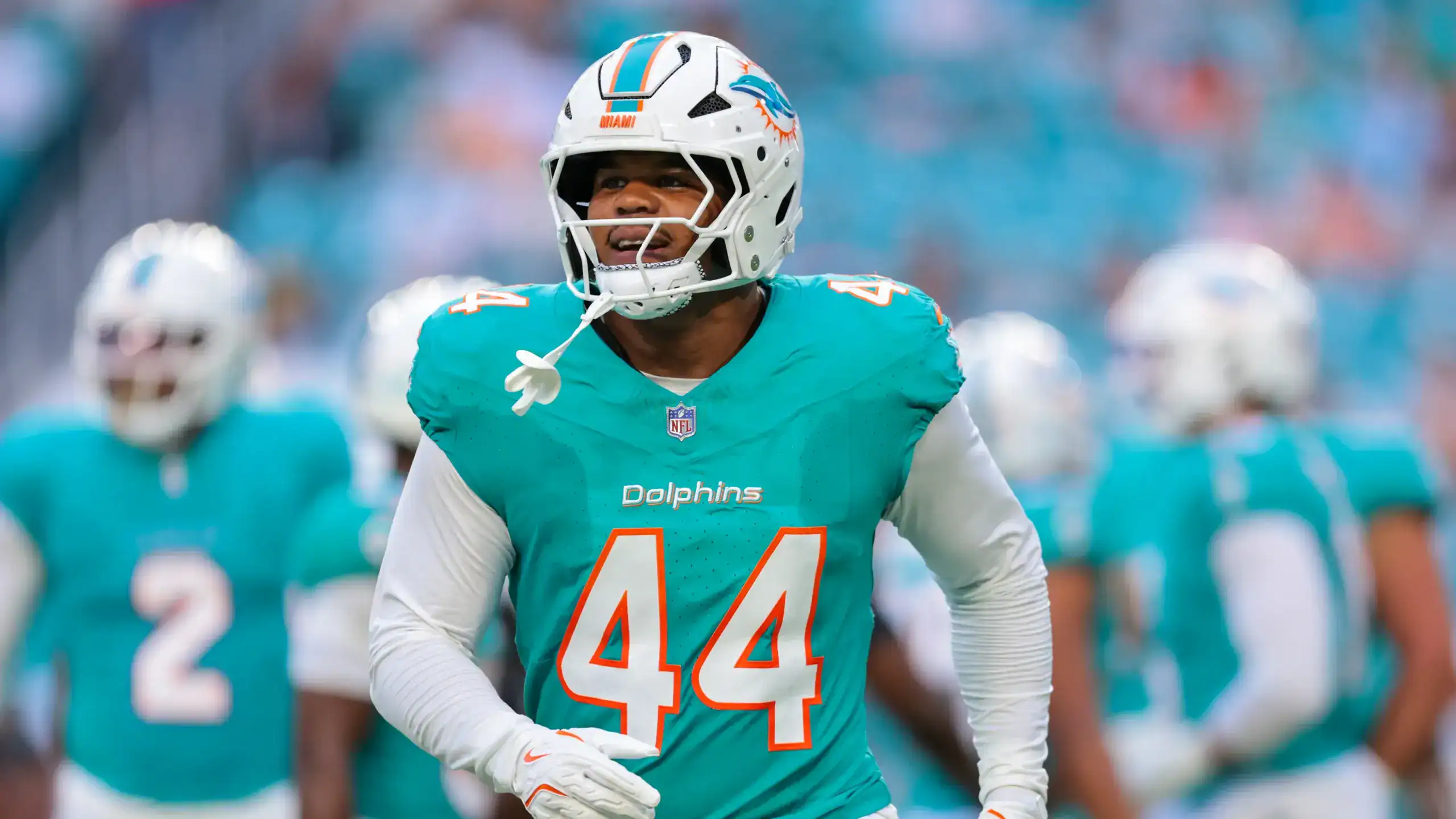 Miami Dolphins edge rusher Chop Robinson looks toward the sideline during a game. Robinson is a possible Dallas Cowboys trade target.