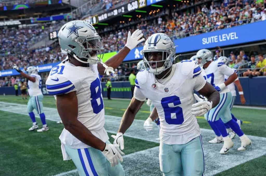 Dallas Cowboys receivers Camden Brown and Jonathan Mingo celebrate after a touchdown. 