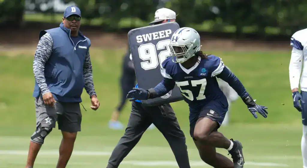 Cowboys v. Cardinals: 5 Players to Watch Dallas Cowboys player Malachi Lawrence works through a pass-rush drill during practice.