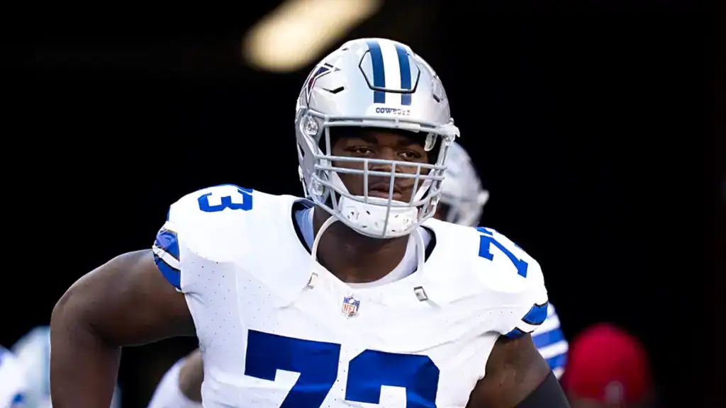 Dallas Has Their Answer at Left Tackle for 2026 Tyler Smith runs on to the field in his Cowboys uniform.