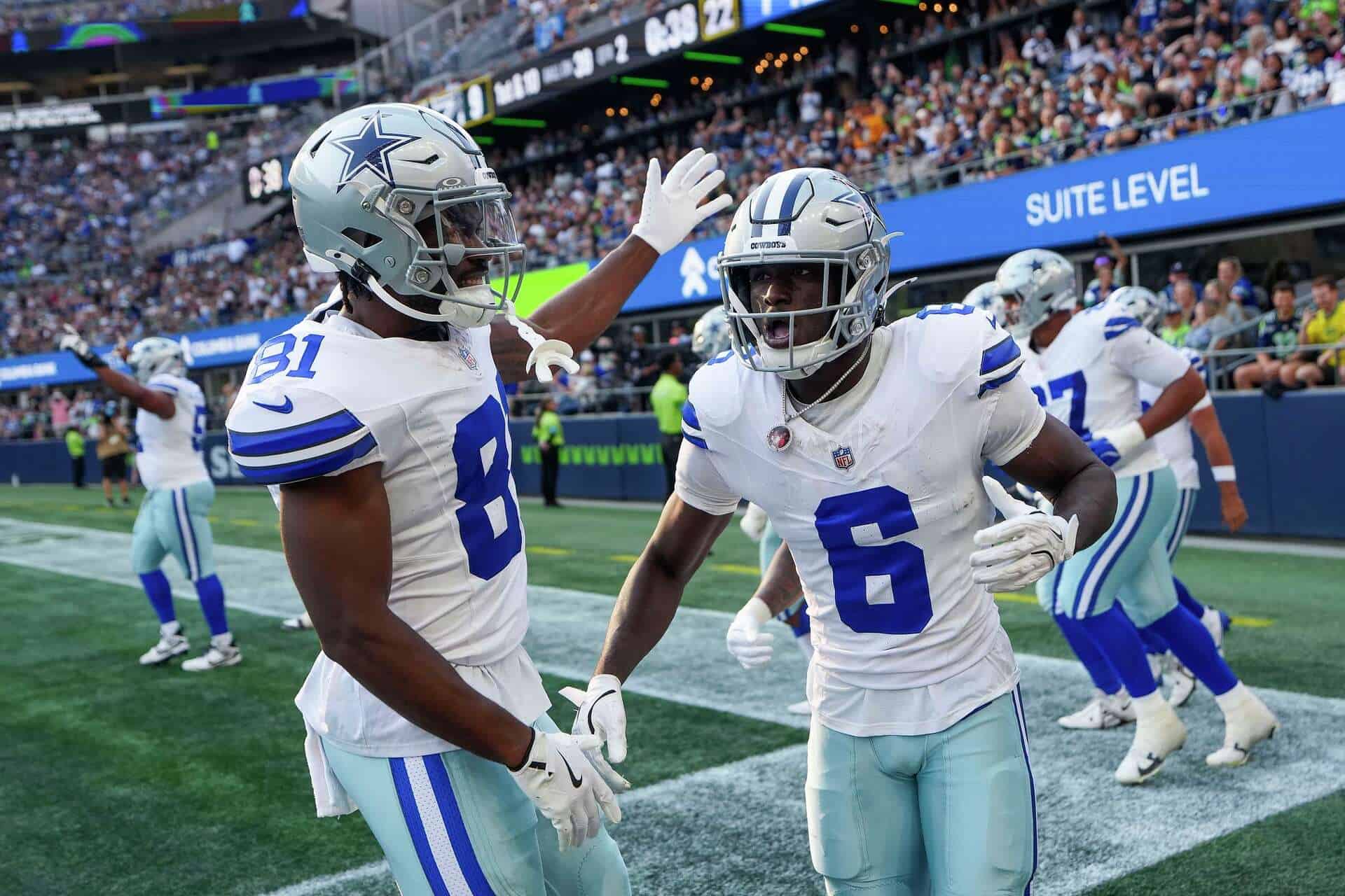 Jonathan Mingo and Camden Brown celebrate together in the end zone during a Dallas Cowboys preseason game against the Seattle Seahawks.