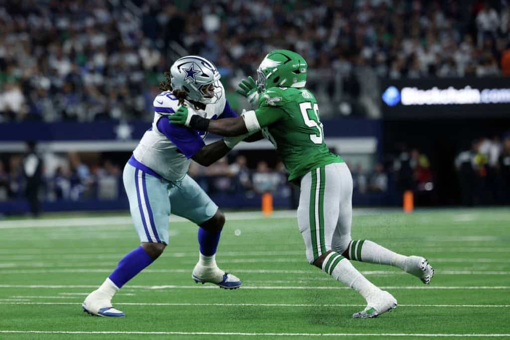 Why Broderick Jones Could Work for the 26' Cowboys? Tyler Guyton battles Philadelphia Eagles edge rusher during a Dallas Cowboys game at AT&T Stadium.