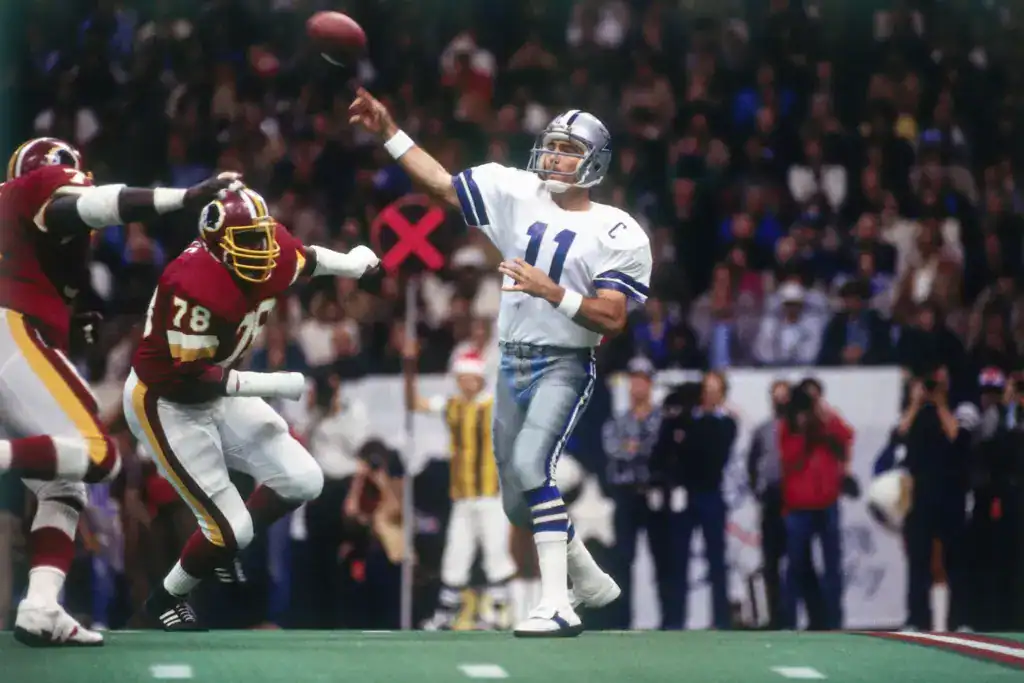 Cowboys Fans Misunderstand What a Franchise Quarterback Is Danny White throws a pass for the Dallas Cowboys against Washington, highlighting the debate over what truly defines a franchise quarterback in Dallas.