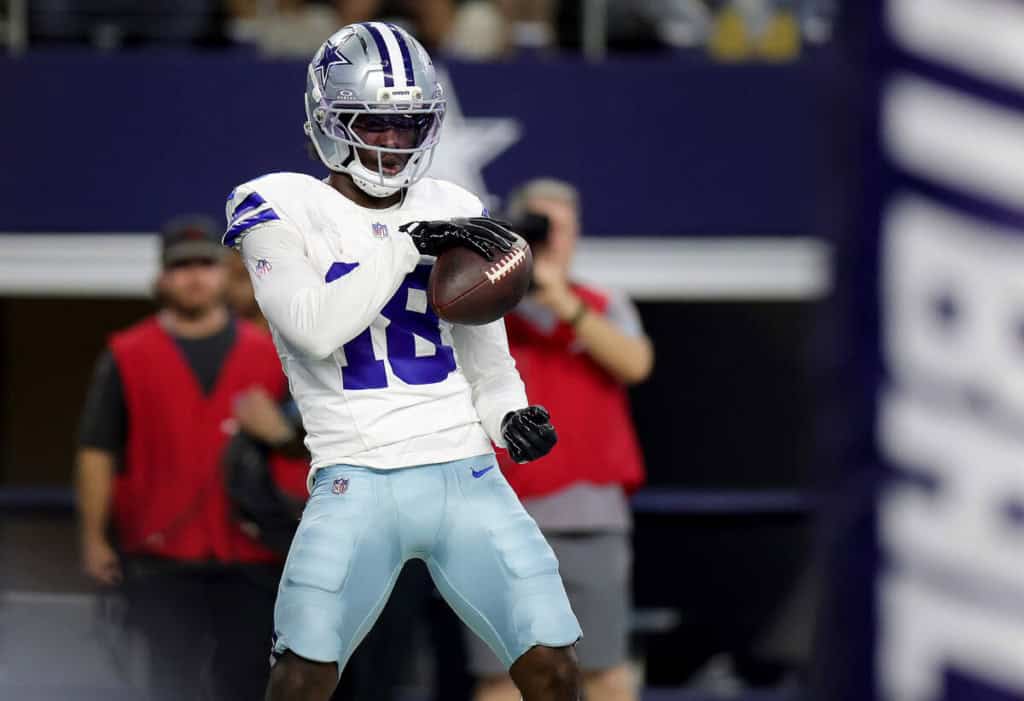 Dallas Cowboys quarterback wide receiver Jordan Hudson celebrates after scoring a touchdown against the New Orleans Saints during a preseason game.