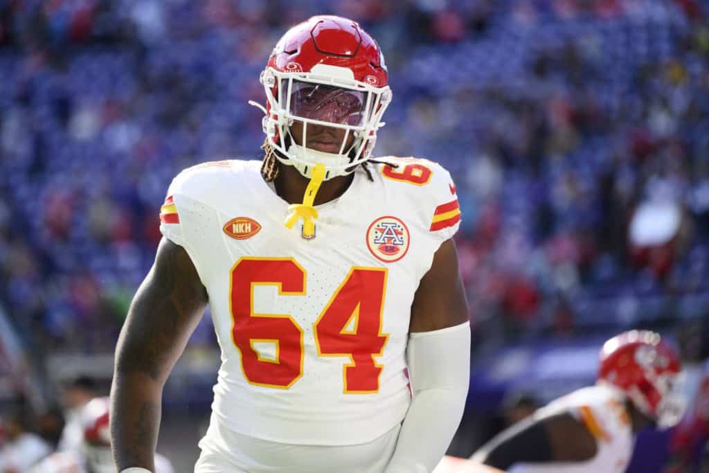 Dallas Cowboys tackle Wanya Morris stands on the field in his former teams jersey (Kansas City Cheifs). Could he get a look at left guard after the Tyler Smith injury?