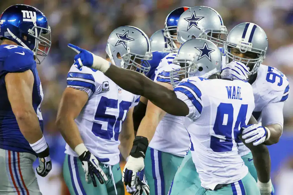 The 2007 Dallas Cowboys defense making a stop against the New York Giants.