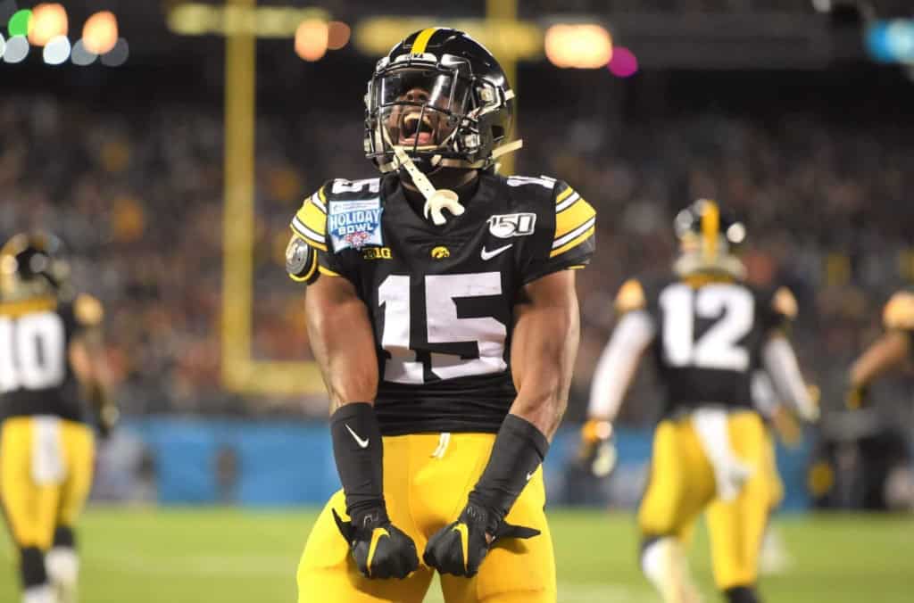 Dallas Cowboys newest running back Tyler Goodson flexing after a big play while playing at the University of Iowa.