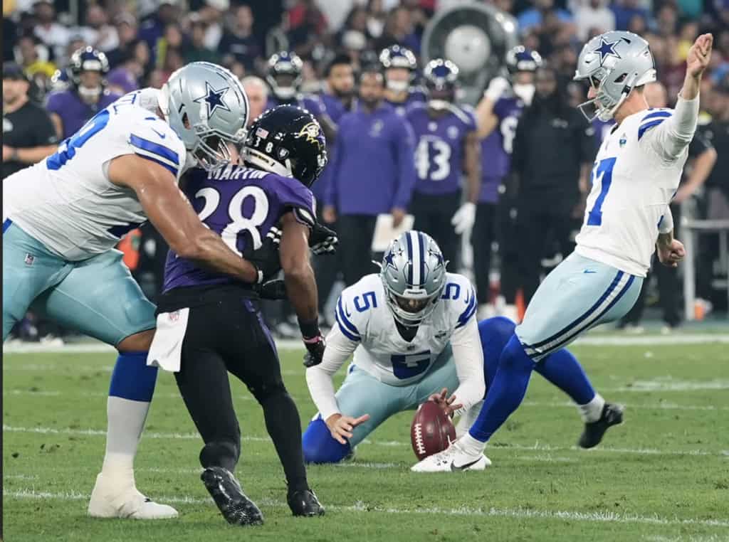 Right tackle Terence Steele allowing a defender to get past him and block the field goal during the Ravens game.