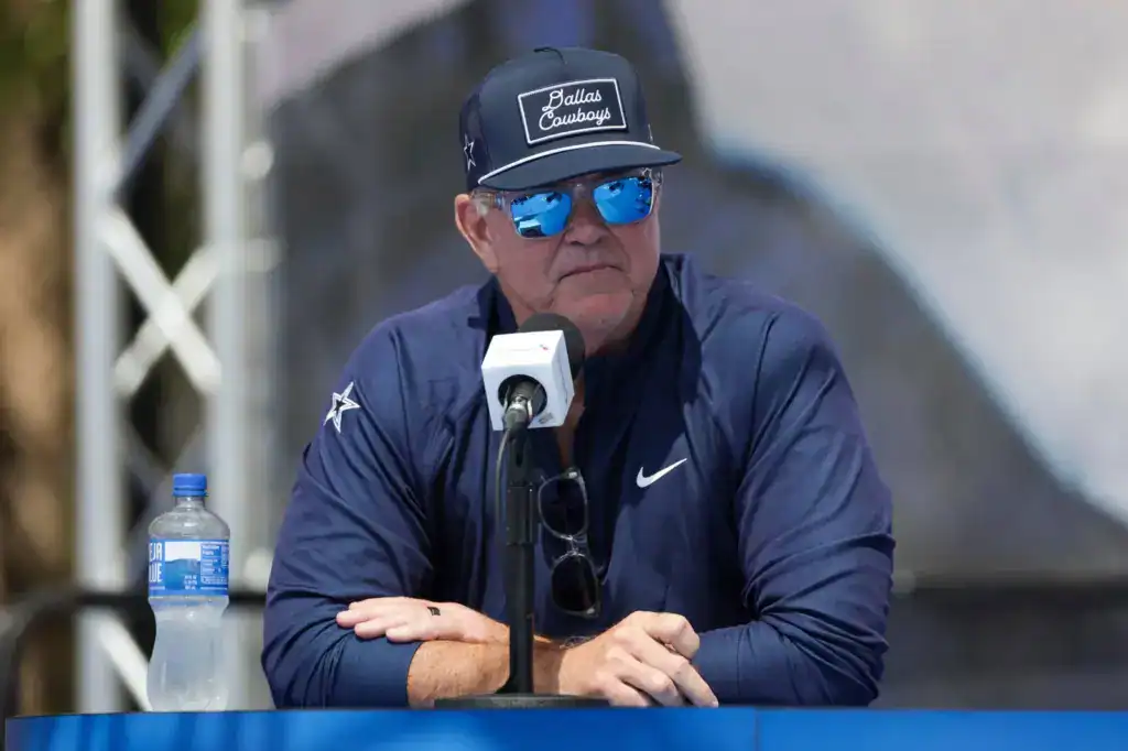 Stephen Jones Raises Questions About George Pickens Contract Dallas Cowboys co-owner Stephen Jones sits at the podium speaking to media during a Dallas Cowboys event.