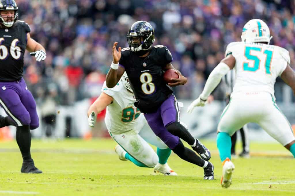 Ravens Pass Protection Gives Dallas 3 Players to Target Lamar Jackson runs the ball agains the Miami Dolphins.