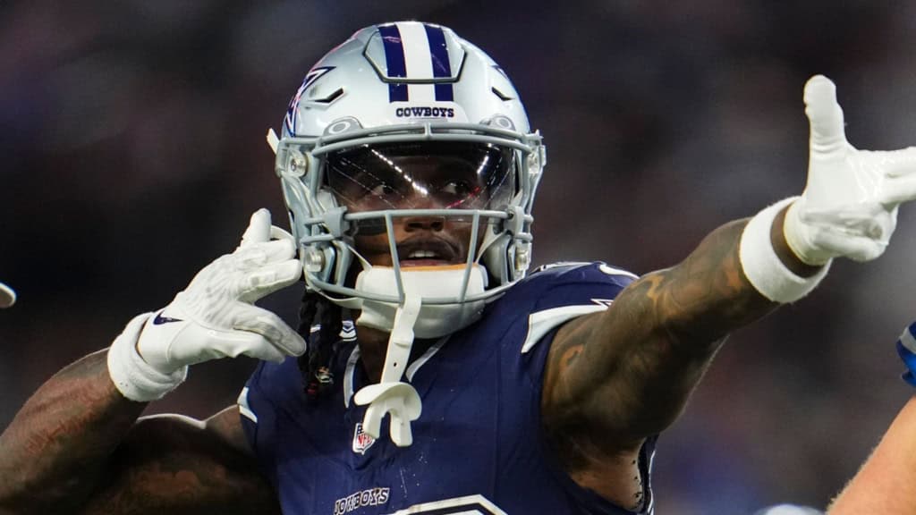 Dallas Cowboys CeeDee Lamb gestures a first down after a catch.