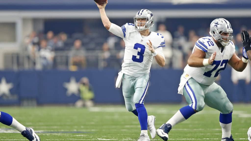 Former Dallas Cowboys quarterback Brandon Weeden throws a pass against the Arizona Cardinals. 