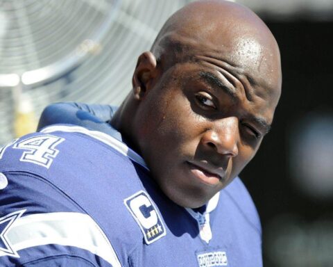 The Star News - DeMarcus Ware Signs Signature Tattoo For Cowboys Fan