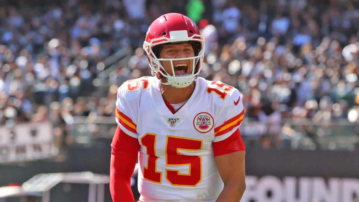 Sep 15, 2019; Oakland, CA, USA; Kansas City Chiefs quarterback Patrick Mahomes reacts after throwing a touchdown pass against the Oakland Raiders in the second quarter at Oakland Coliseum. Mandatory Credit: Cary Edmondson-USA TODAY Sports