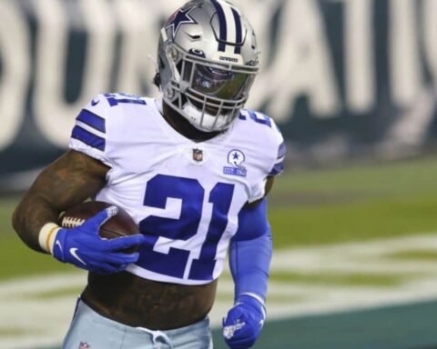 Cowboys' Elliott Limited in Practice, Plans to Play Through Calf Injury