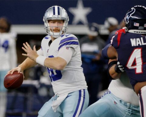 a football player in a uniform with a football