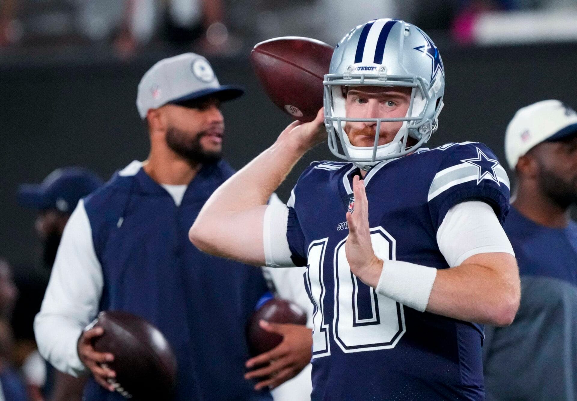 Sep 26, 2022; East Rutherford, New Jersey, USA; Dallas Cowboys quarterback Cooper Rush (10) warms up in front of quarterback Dak Prescott before the game against the New York Giants at MetLife Stadium. Mandatory Credit: Robert Deutsch-USA TODAY Sports