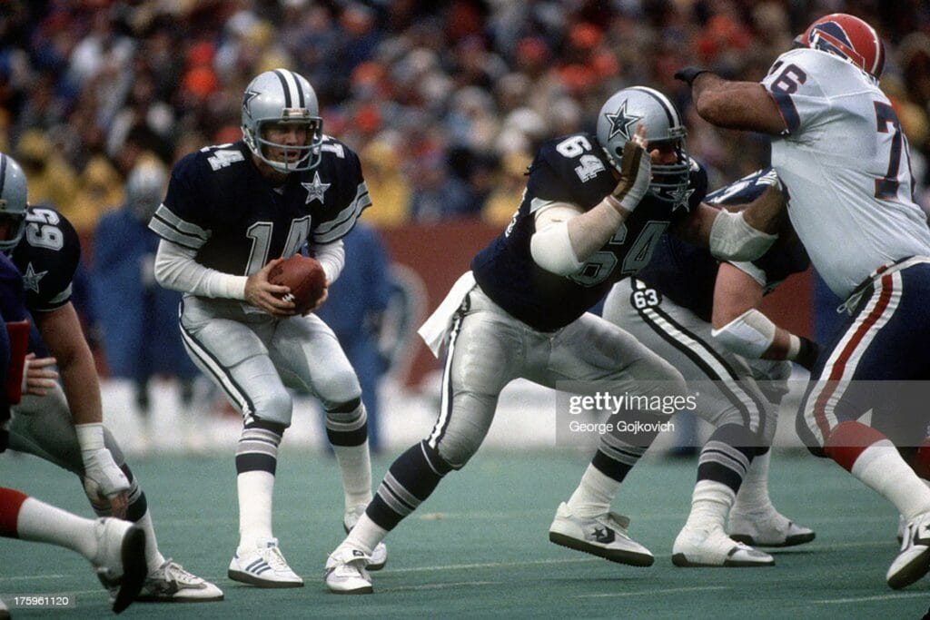A quarterback controversy arises in 1984