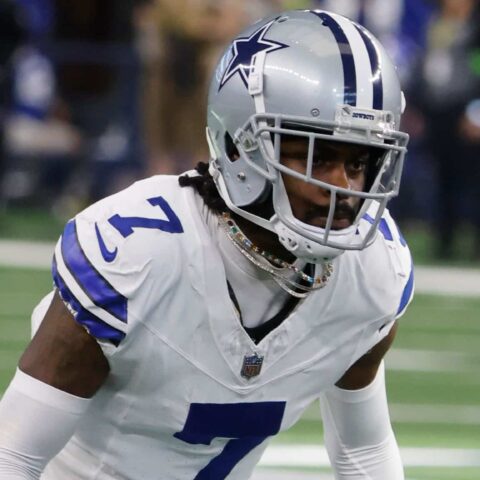 Football player in Dallas Cowboys uniform with number 7 on the field.