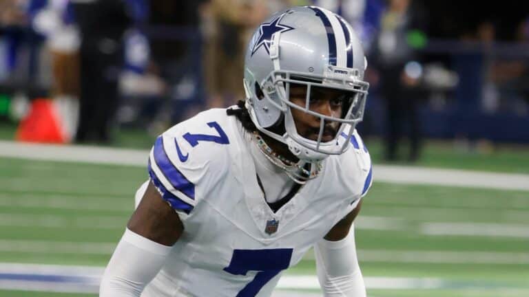 Football player in Dallas Cowboys uniform with number 7 on the field.