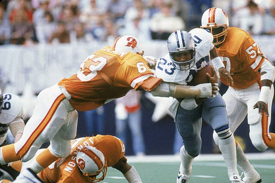 Football: NFC Playoffs: Tampa Bay Buccaneers Lee Roy Selmon (63) in action, making tackle vs Dallas Cowboys James Jones (23) at Texas Stadium.
Getty Images
