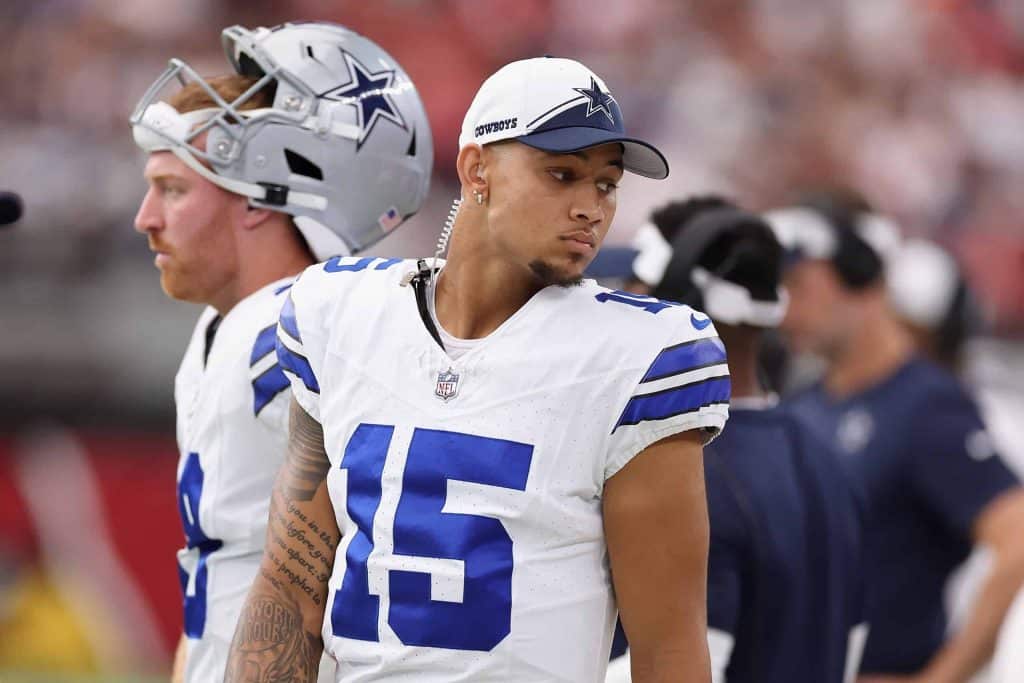 Familiar Faces: Cowboys will face 3 former players in 2025 - Chauncey Golston | Rico Dowdle | Trey Lance Two football players in Dallas Cowboys uniforms are seen on the sideline during a game, one wearing a helmet, the other a cap.