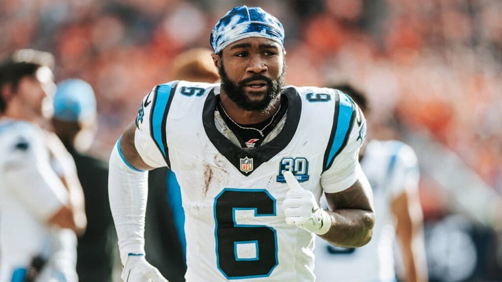 RB Miles Sanders in a Carolina Panthers uniform warming up before a game