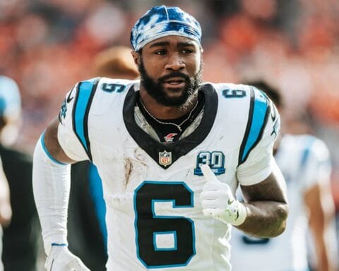 RB Miles Sanders in a Carolina Panthers uniform warming up before a game