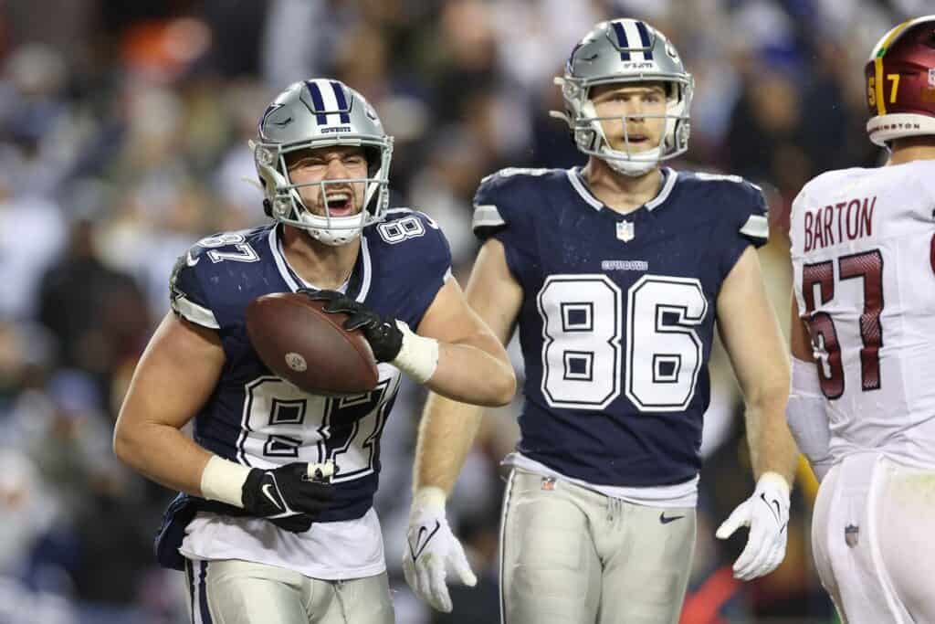 Dallas Cowboys tight ends Jake Ferguson and Luke Schoonmaker standing side by side wearing navy blue Dallas Cowboys jerseys. Tight End Battle: 2025 Cowboys Could See a Shake-Up