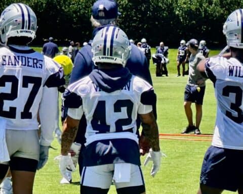 Cowboys' running backs from left to right: Miles Sanders #27, Deuce Vaughn #42, and Javonte Williams #33