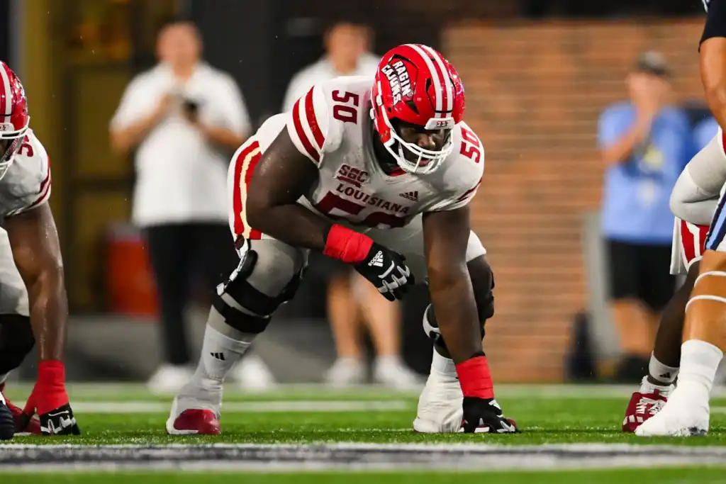Dallas Cowboys offensive lineman Nathan Thomas playing for his college team, the Louisiana Ragin Cajuns. 1 Cowboys Injury Opened the Door for Nathan Thomas