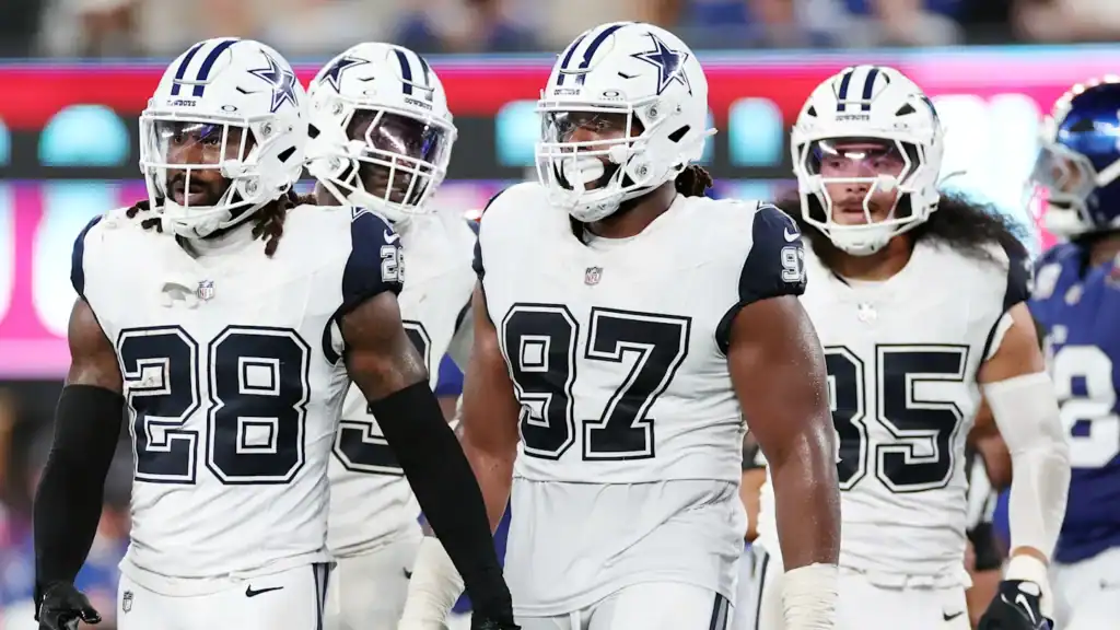 Dallas Cowboys defensive players Malik Hooker, Osa Odighizuwa, and Marist Liufau walking off the field. The NFC East's Most Dangerous Roster Belongs to the Cowboys