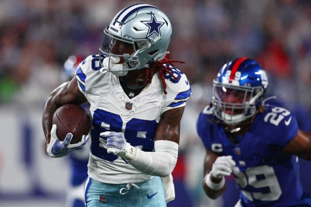 Dallas Cowboys Wide Receiver CeeDee Lamb runs past a New Giants player. The Ultimate Cowboys 2025 Schedule Series: Weeks1-5