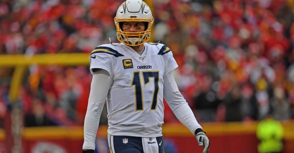 San Diego Chargers former quarterback Philip Rivers glaring downfield after a play. Tony Romo's Legacy vs. 4 Hall of Fame Eligible QBs