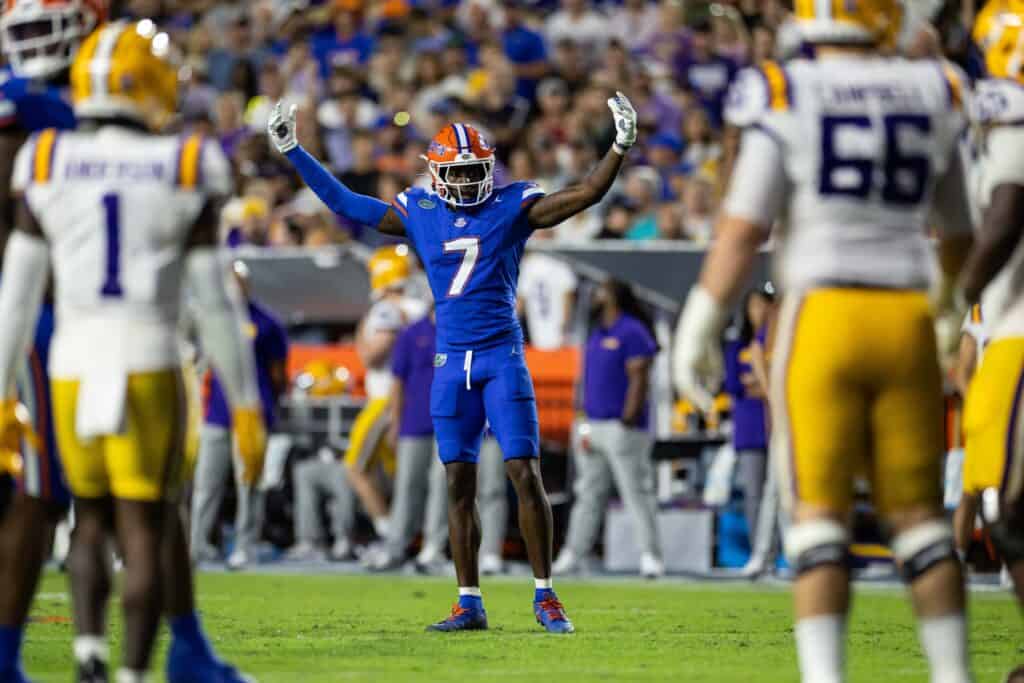 Florida Gators cornerback Trikweze Bridges celebrating after a big play. Altar text: Florida Gators football player celebrating during a game.